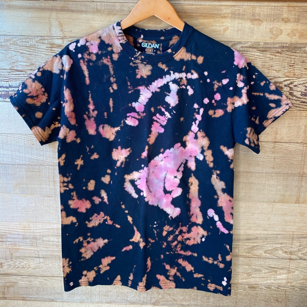Reverse tie dye in black short sleeve shirt